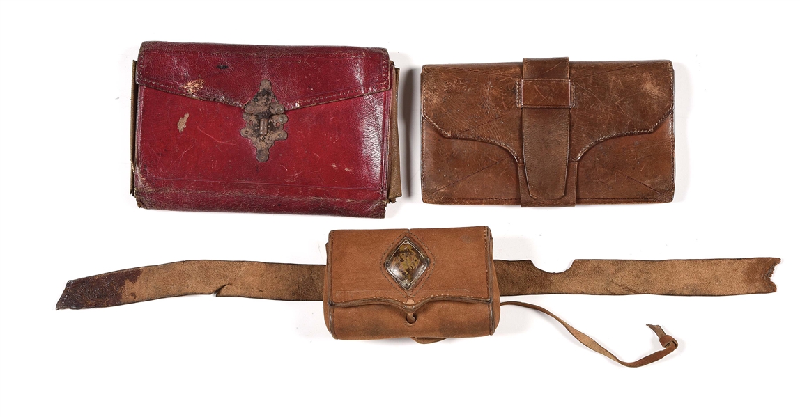 LOT OF 3: 2 LEATHER WALLETS AND A LEATHER STRIKER POUCH.