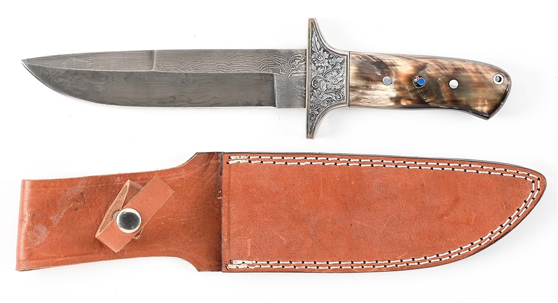 IMITATION DAMASCUS DROP POINT KNIFE WITH ORNATE CROSSGUARD.