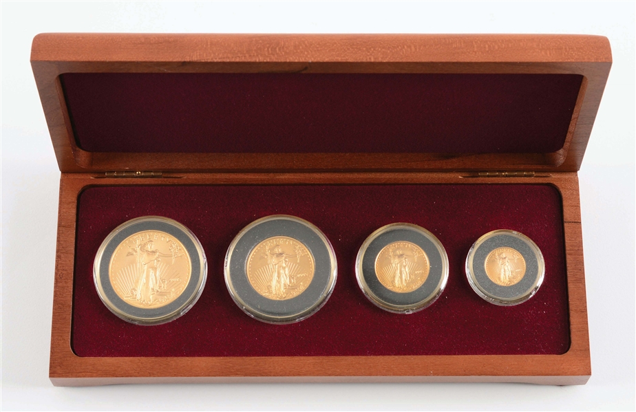 2005 4 COIN GOLD SET IN WOODEN BOX.