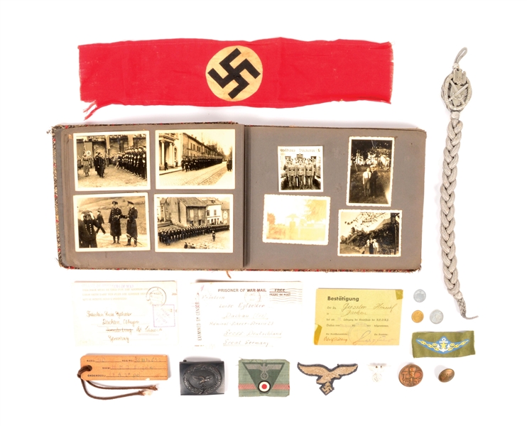 LOT OF MISCELLANEOUS GERMAN WWII INSIGNIA AND PHOTO ALBUM.