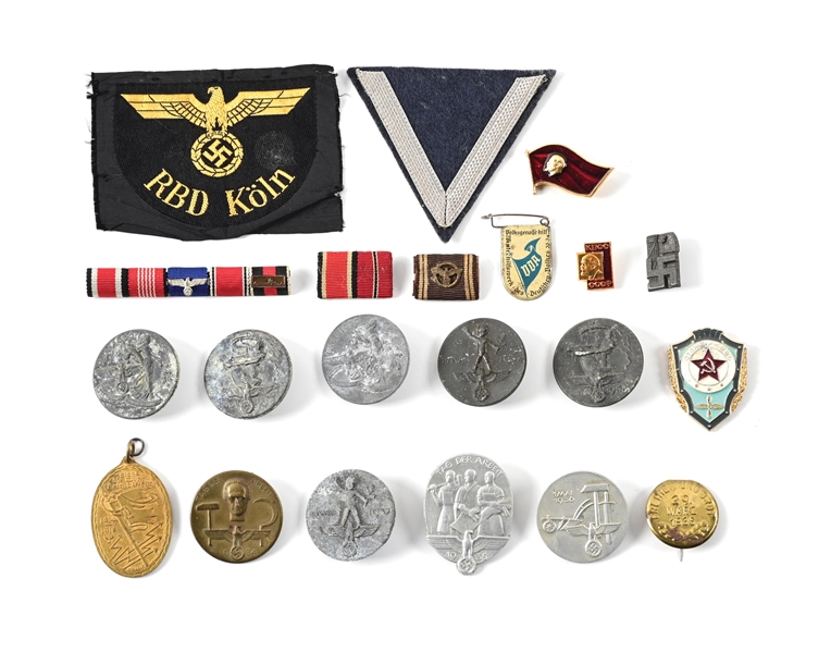 LOT OF GERMAN WWII INSIGNIA AND TINNIES.