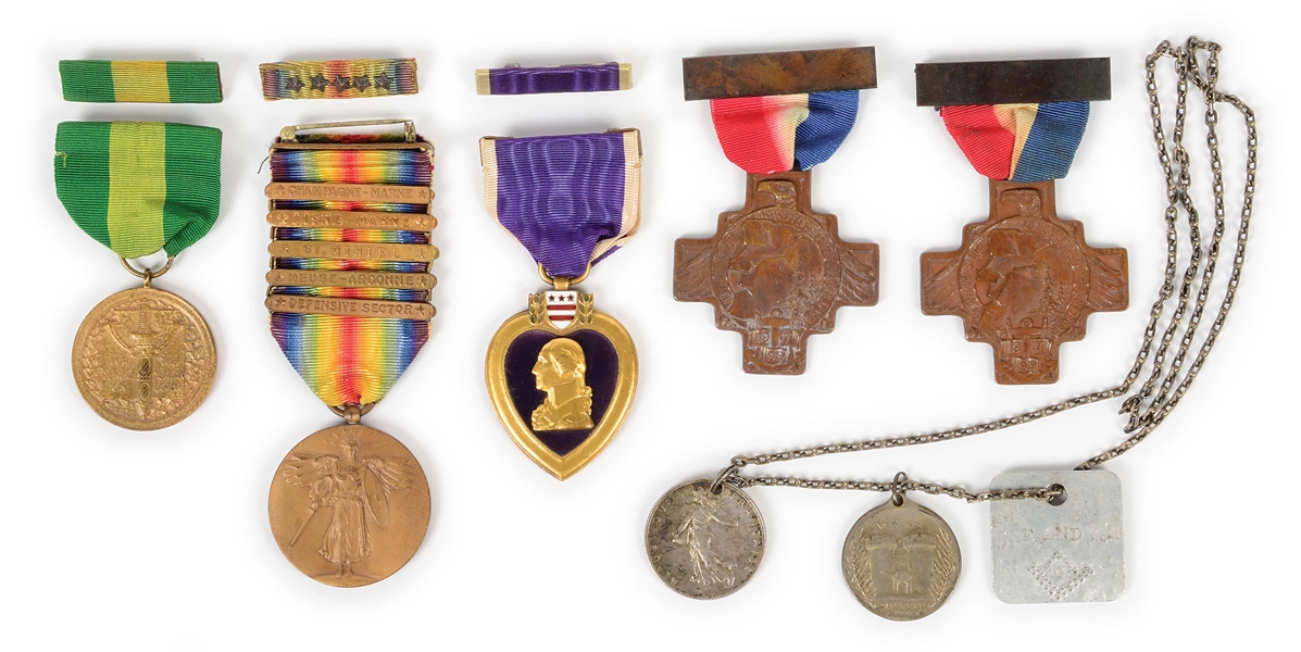 US WWI ENGRAVED PURPLE HEART, VICTORY MEDAL, AND UNOFFICIAL DOG TAG GROUPING.
