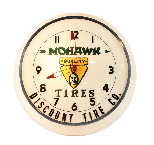 LIGHTED PLASTIC CLOCK FROM MOHAWK TIRES.