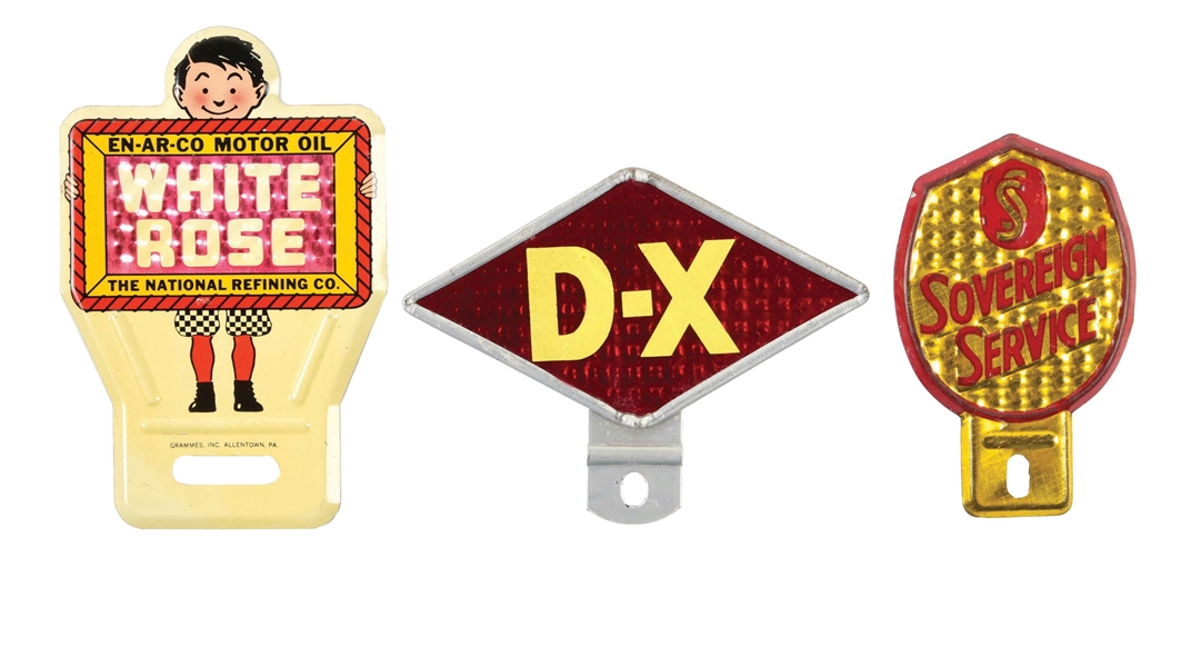 GROUP OF 3: NEW OLD STOCK EMBOSSED TIN LICENSE PLATE TOPPERS. 