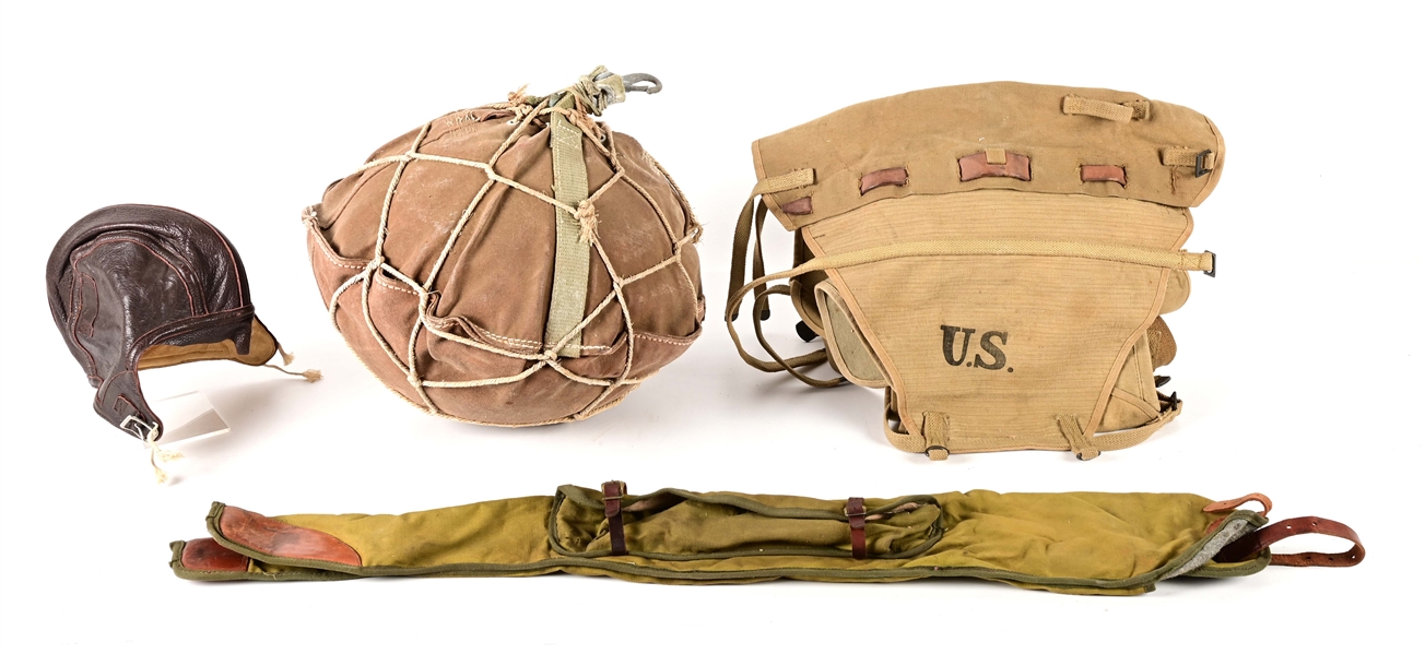 LOT OF 4: CANVAS FLOATING DEVICE, CANVAS RIFLE CASE, LEATHER FLIGHT HELMET, AND WW1 CANVAS AMMO BAG.