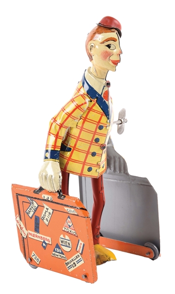 GERMAN DISTLER WIND-UP MAN WITH SUITCASES TOY.