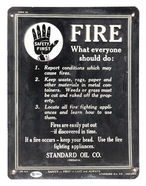 STANDARD OIL COMPANY EMBOSSED TIN SAFETY FIRST STATION SIGN. 