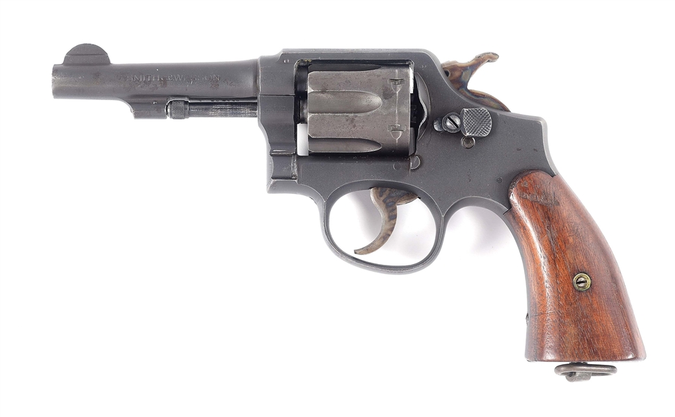 (C) SMITH AND WESSON VICTORY DOUBLE ACTION REVOLVER.