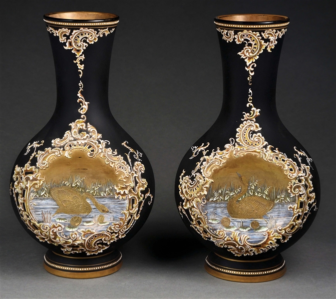 PAIR OF BLACK AND GOLD SWAN VASES.