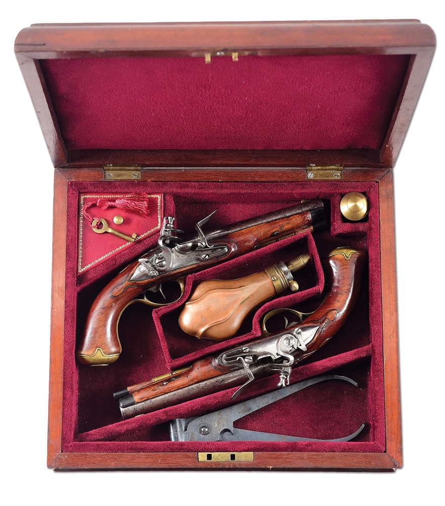 (A) PAIR OF CONTINENTAL FLINTLOCK PISTOLS WITH DOGS IN CASE.