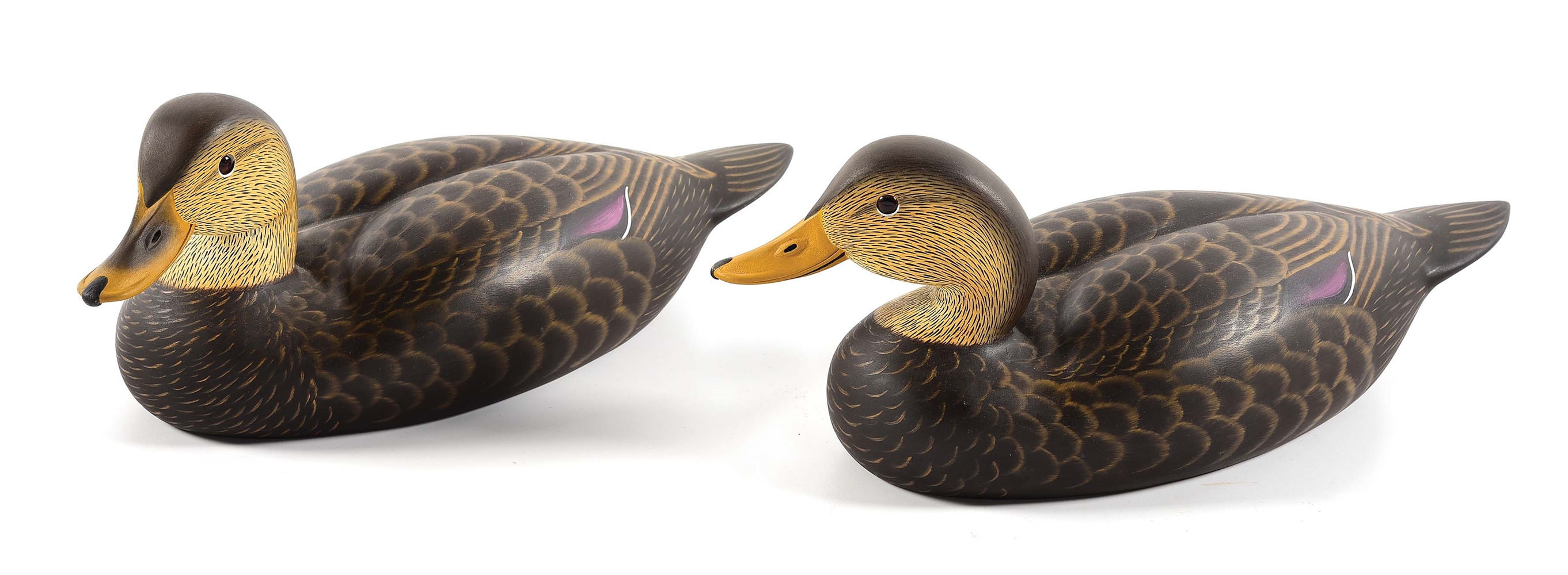PAIR OF HAND CARVED ARTISAN DUCK DECOYS.