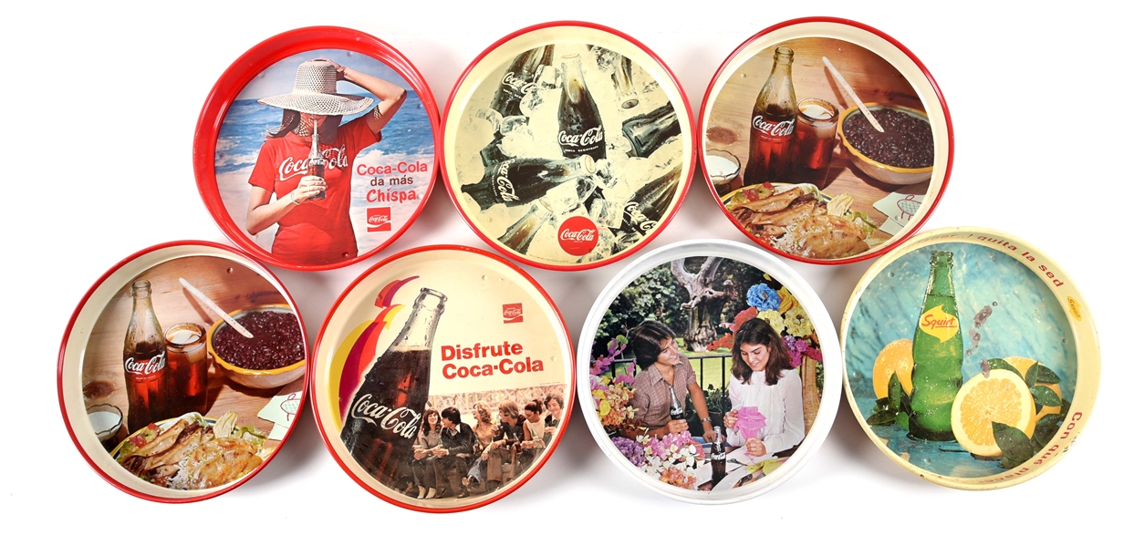 LARGE LOT OF FOREIGN COCA-COLA SERVING TRAYS.