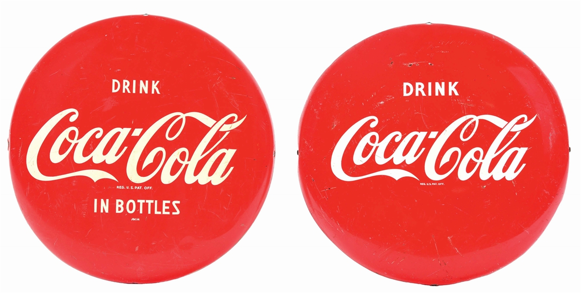 LOT OF 2: 16" COCA-COLA BUTTONS.