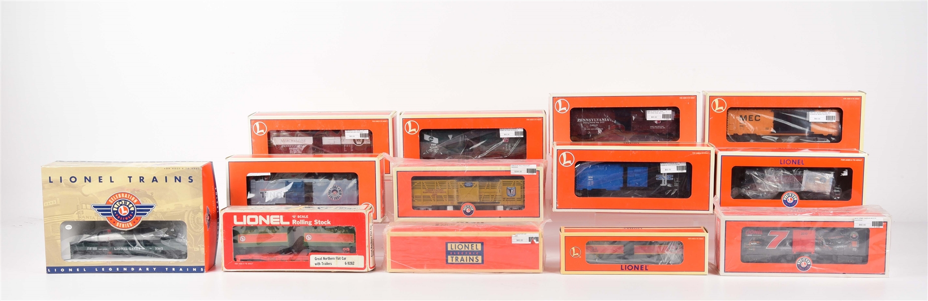 LOT OF 13: VARIOUS LIONEL MPC CELEBRATION AND CONTEMPORARY FREIGHT CARS IN ORIGINAL BOXES.