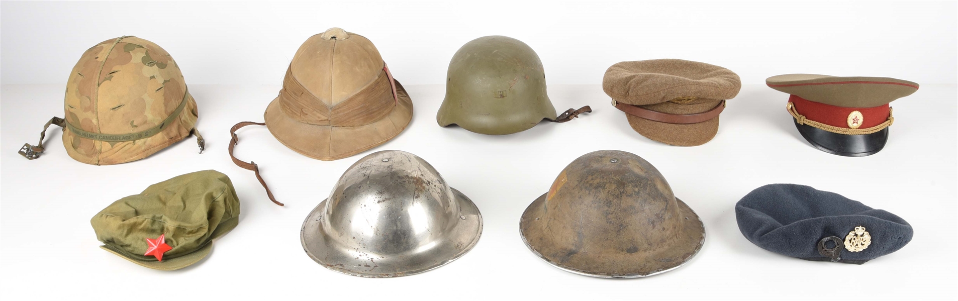 LOT OF WWI-COLD WAR HATS AND HELMETS.