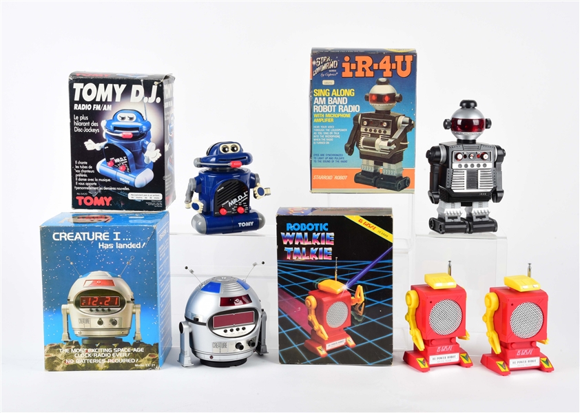 LOT OF 4: BATTERY-OPERATED HONG KONG ROBOT RADIO & WALKIE TALKIE TOYS IN ORIGINAL BOXES.