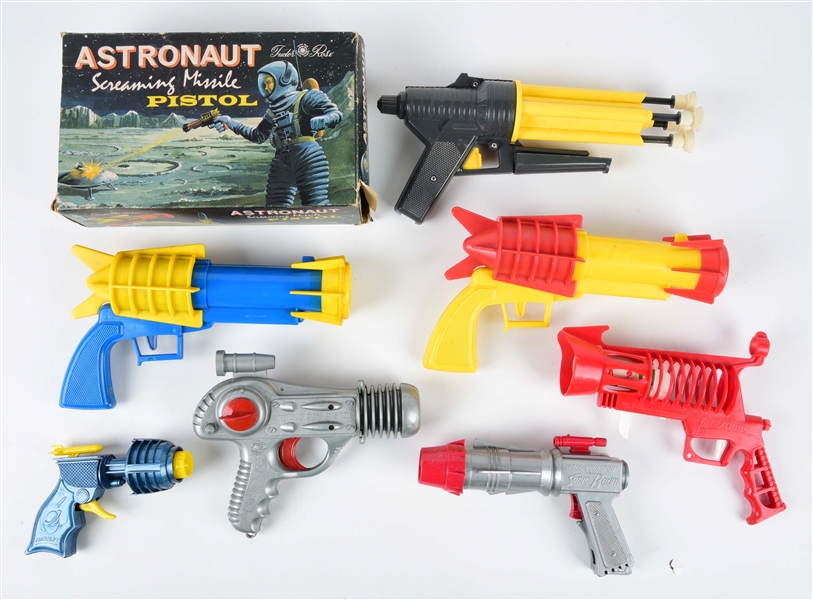 LOT OF 7: MADE IN ENGLAND SPACE GUNS.