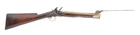 (A) BRASS BARRELLED BLUNDERBUSS BY NOCK WITH TOP MOUNTED SPRINGLOADED BAYONET.