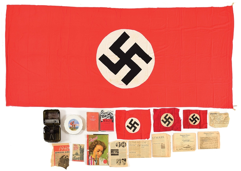 LOT OF THIRD REICH FLAGS, NSDAP HANDBOOK, AND MISCELANEOUS ITEMS.