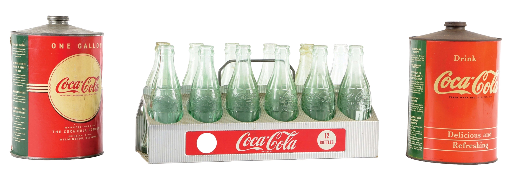 COLLECTION OF 2 COCA-COLA SYRUP TINS.
