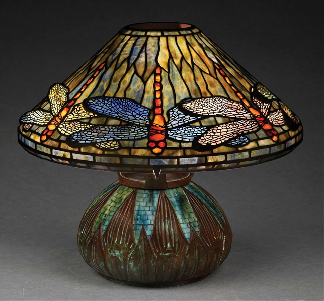 DRAGONFLY LEADED GLASS LAMP ON MOSAIC BASE IN THE STYLE OF TIFFANY STUDIOS.