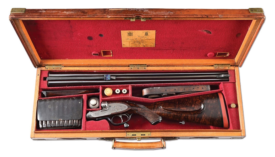 (C) CASED J. PURDEY & SONS .500/465 DOUBLE RIFLE WITH NOTED AFRICAN PROVENANCE.