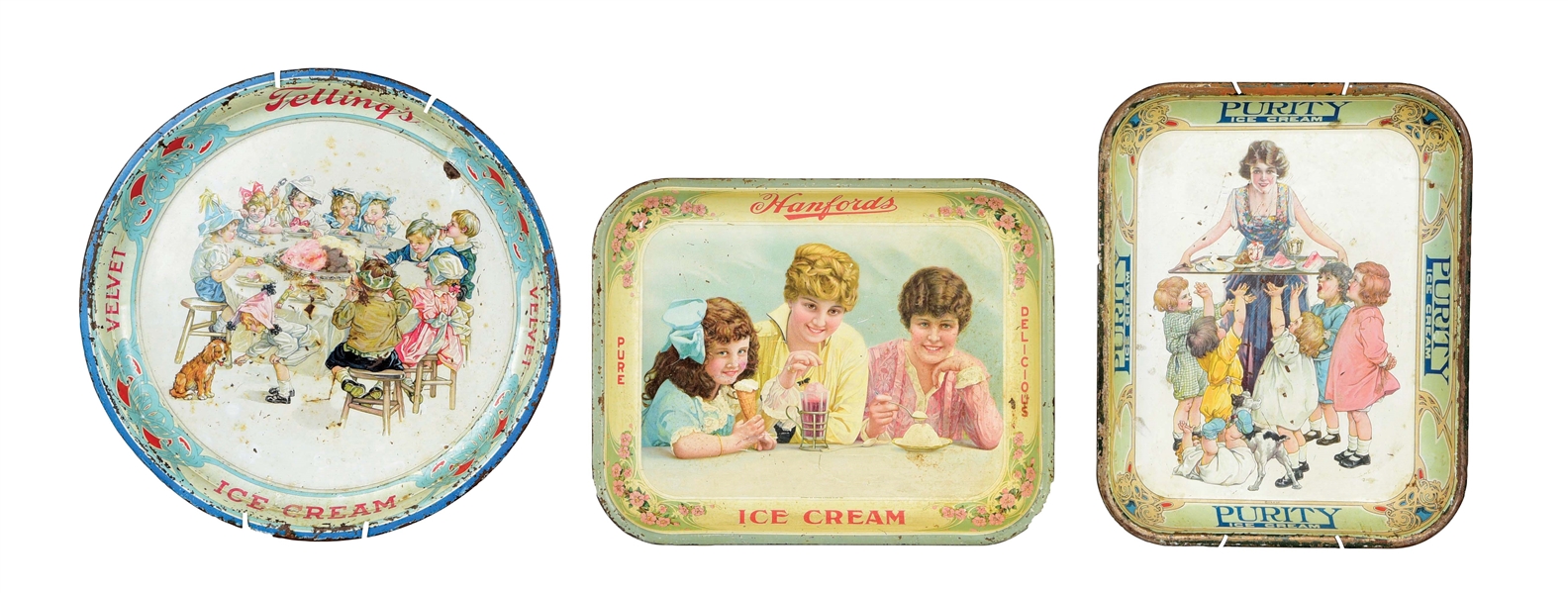 LOT OF 3: VARIOUS TIN ICE CREAM SERVING TRAYS.