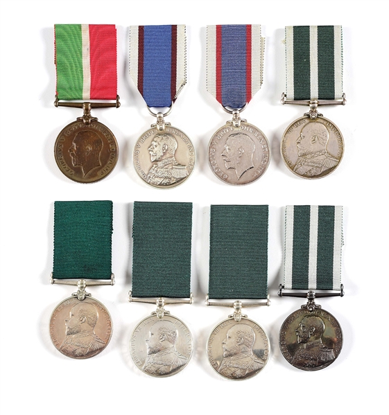LOT OF 8: NAMED BRITISH ROYAL NAVY RESERVE AND FLEET RESERVE LONG SERVICE MEDALS.