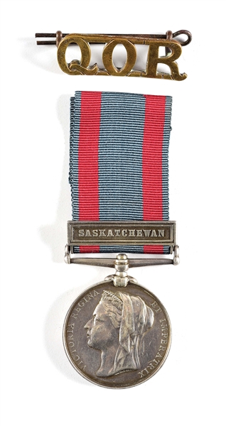 NAMED BRITISH NORTH WEST CANADA MEDAL WITH SASKATCHEWAN CLASP AND QOR CAP BADGE.