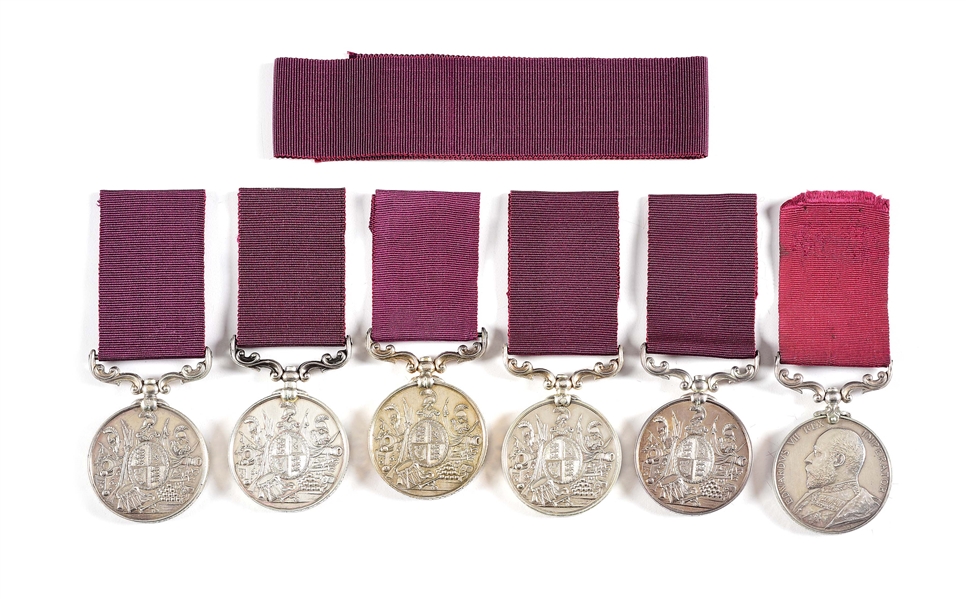 LOT OF 6: NAMED BRITISH ARMY LONG SERVICE AND GOOD CONDUCT MEDALS WITH EXTRA RIBBON.