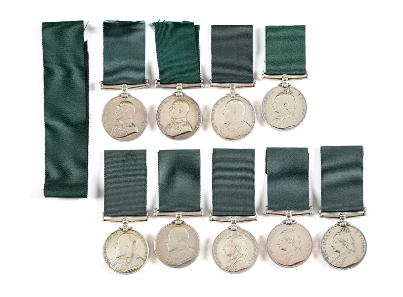LOT OF 9: NAMED BRITISH VOLUNTEER SERVICE LONG SERVICE MEDALS WITH EXTRA RIBBON.