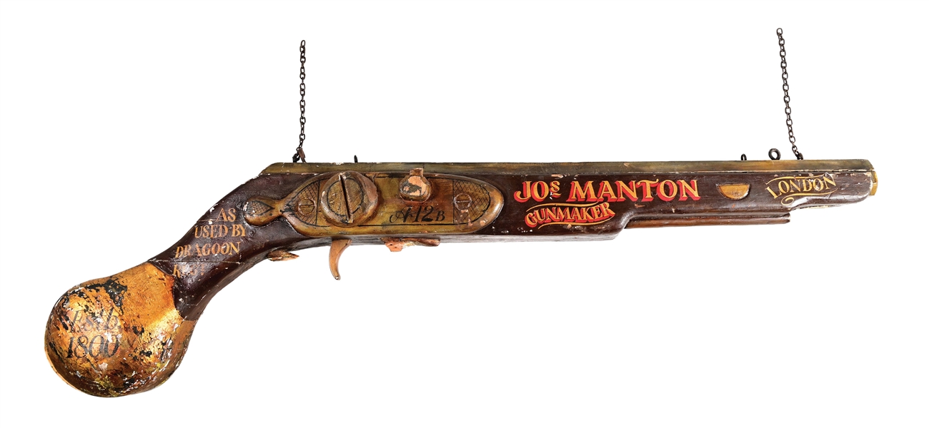 JOSEPH MANTON GUNMAKER LARGE WOODEN GUN SIGN.