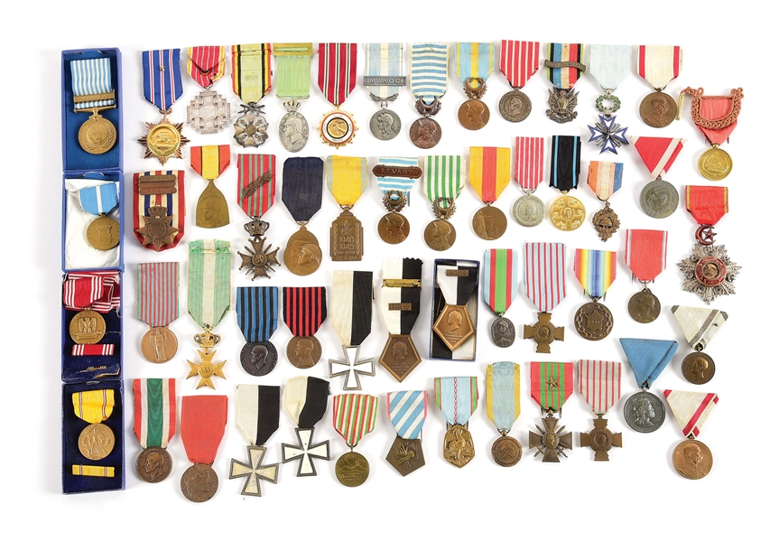 MASSIVE LOT OF WWI-WWII MEDALS FROM VARYING NATIONS.