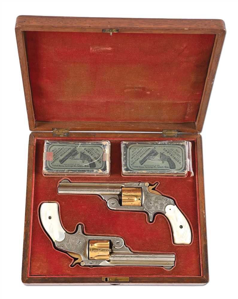 (A) LOVELY CASED PAIR OF NEW YORK ENGRAVED SMITH & WESSON SECOND MODEL .38 SINGLE ACTION REVOLVERS.