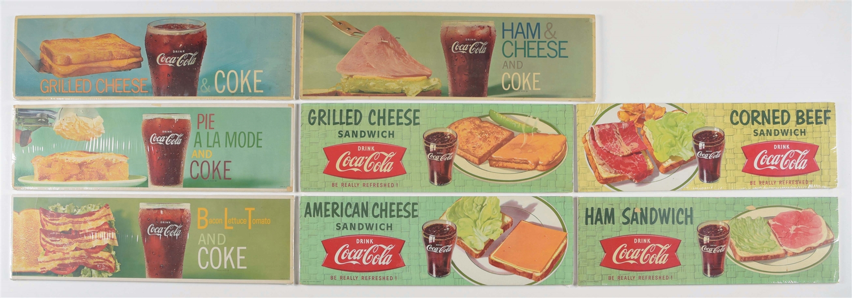 COLLECTION OF 8 COCA-COLA PAPER LITHOGRAPHED CHANNEL SIGNS.