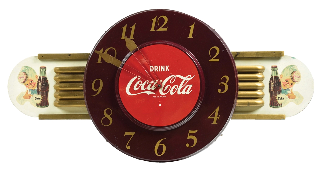 "DRINK COCA-COLA" TIN CLOCK ATTACHED TO A KAY DISPLAYS PIECE W/ SPRITE BOY GRAPHIC.