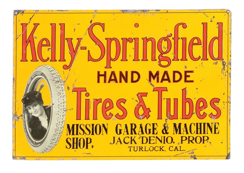 RARE KELLY SPRINGFIELD TIRES & TUBES EMBOSSED TIN SIGN W/ TIRE & LOTTA MILES GRAPHIC. 