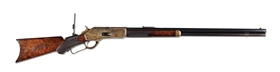 (A) FACTORY ENGRAVED DELUXE WINCHESTER MODEL 1876 LEVER ACTION RIFLE IN THE STYLE OF A 1 OF 1000.