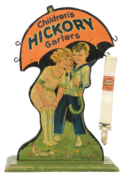 EXTREMELY EARLY CHILDRENS HICKORY GARTERS DIE-CUT WOODEN POINT OF SALE DISPLAY W/ CHILDREN & DOG GRAPHIC.