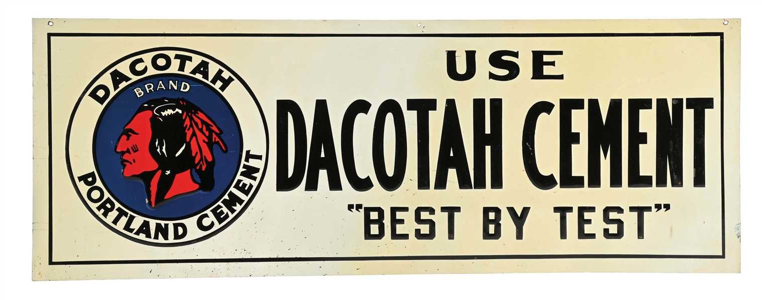 DACOTAH CEMENT "BEST BY TEST" EMBOSSED TIN SIGN W/ NATIVE AMERICAN GRAPHIC.