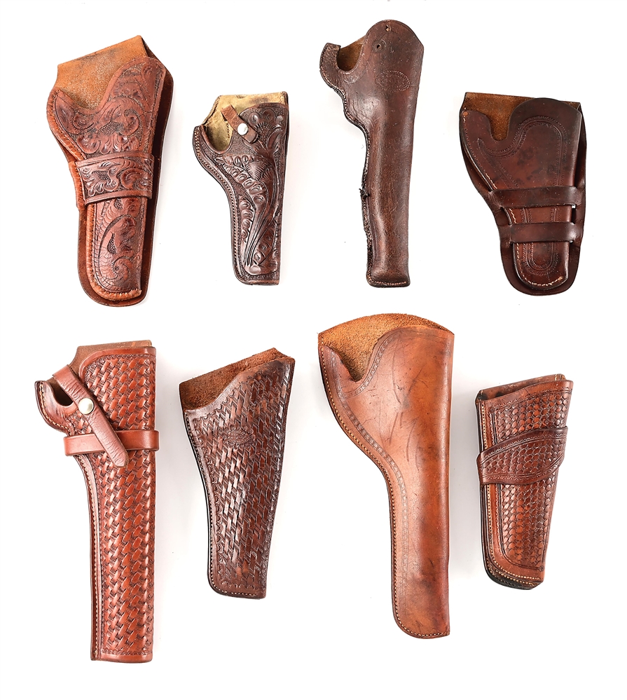 LOT OF 8: BROWN LEATHER HOLSTERS.