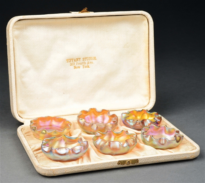 SET OF 6 TIFFANY STUDIOS GLASS SALTS IN ORIGINAL BOX.