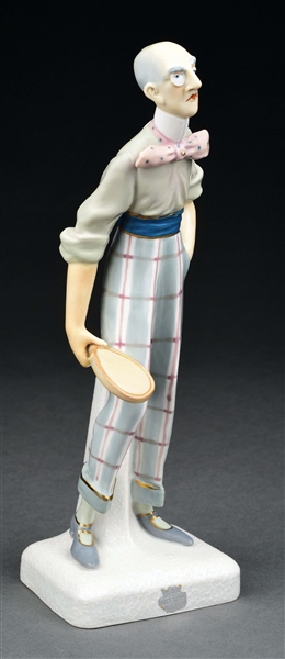 AMPHORA EARTHENWARE TENNIS PLAYER WITH PLAID PANTS AND BOWTIE CARICATURE FIGURE.