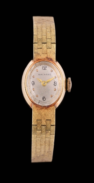 LADIES VINTAGE 14K GOLD NAVARRE MECHANICAL WIND WRISTWATCH.