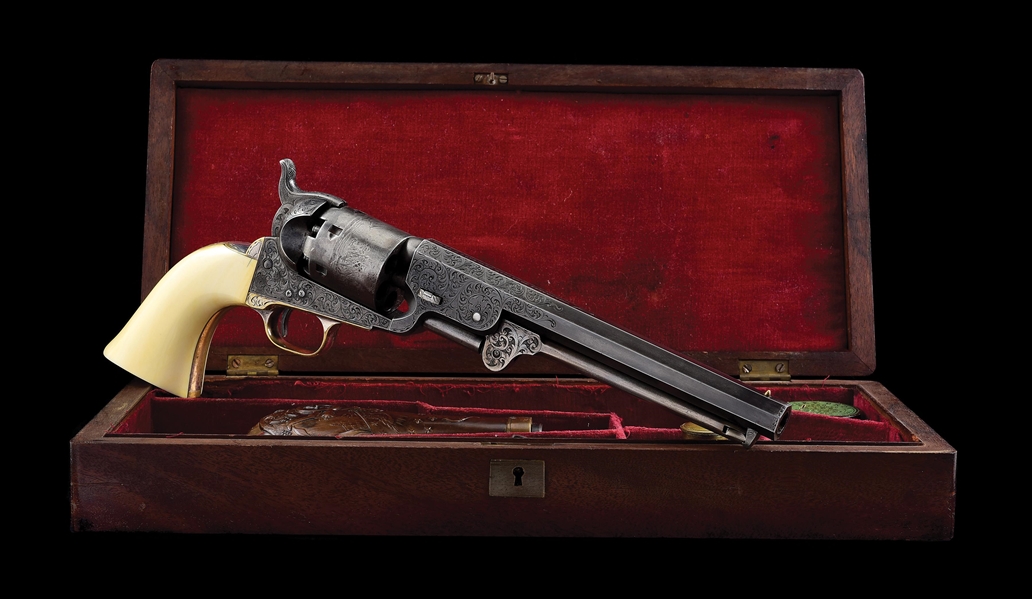 (A) CASED AND ENGRAVED COLT 1851 NAVY WITH IVORY GRIPS AND ACCESSORIES.