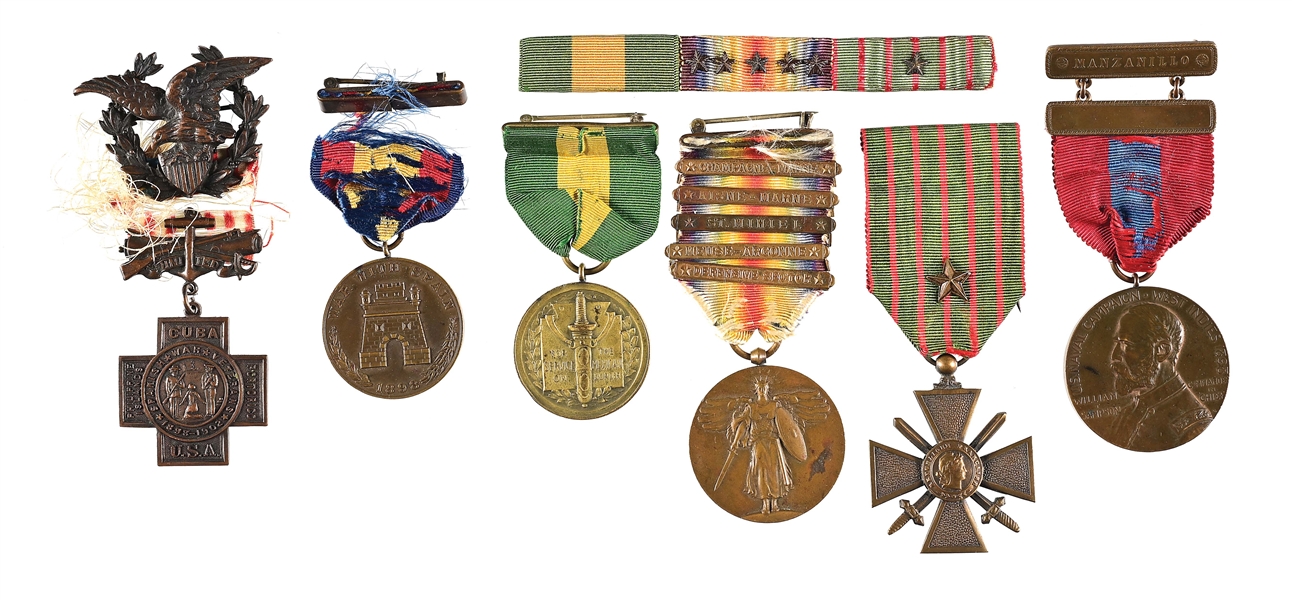 FANTASTIC SPANISH AMERICAN WAR-WWI MEDAL GROUPING NAMED TO A MEMBER OF HUNTINGTONS FIRST MARINE BATTALION.