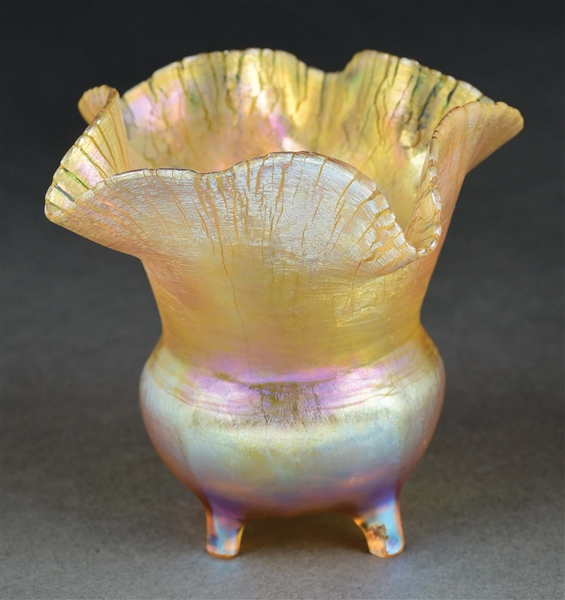 TIFFANY STUDIOS 4-FOOTED FAVRILE GLASS VASE.