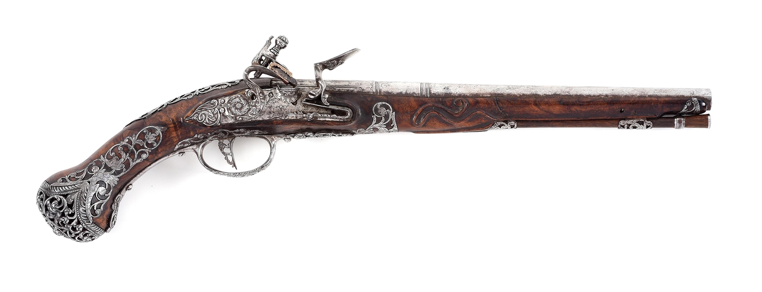 (A) AN EXTREMELY ATTRACTIVE BRESCIAN FLINTLOCK PISTOL BY PIETRO AGOSTI WITH EXTENSIVE CHISELWORK AND INLAYS.