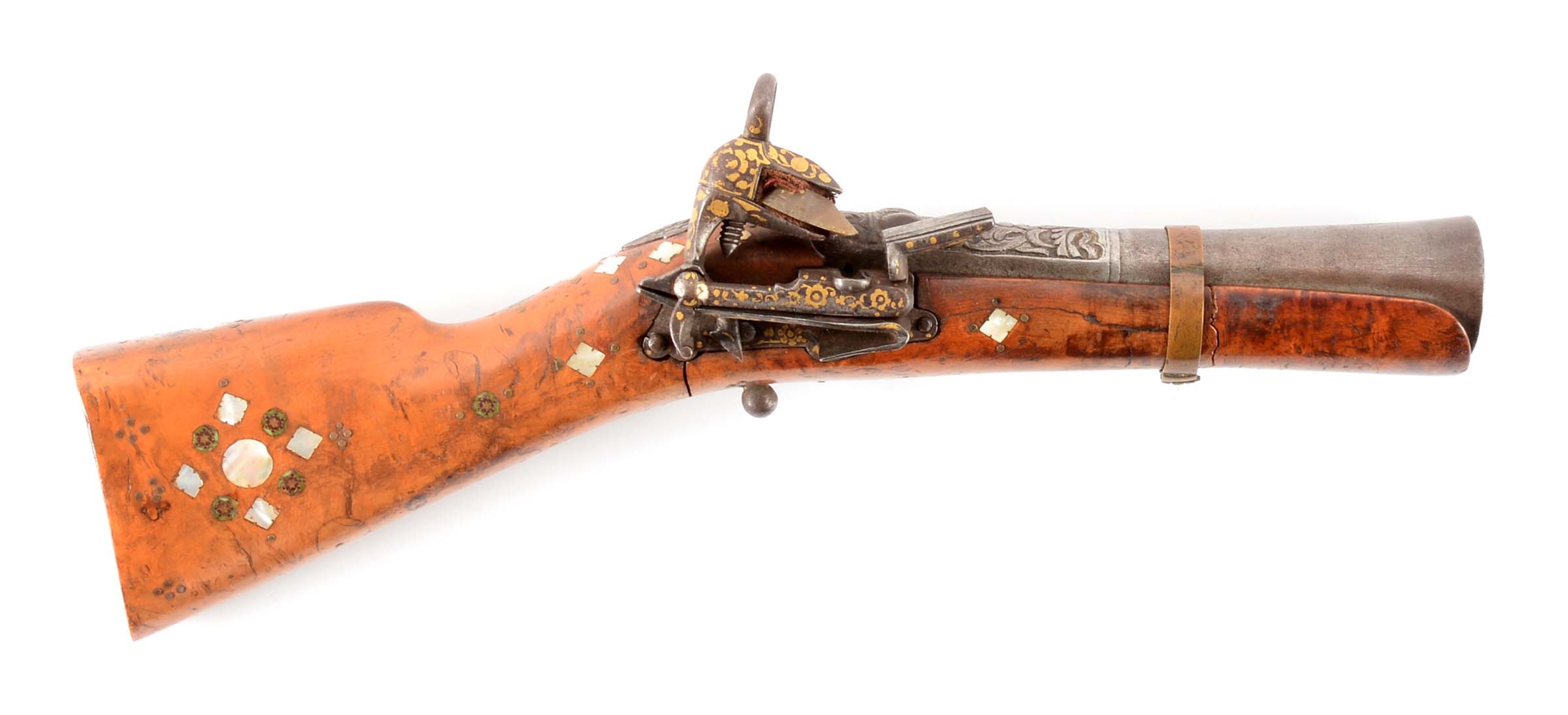 (A) AN UNUSUALLY WELL DECORATED KNEE GUN WITH MIQUELET LOCK.