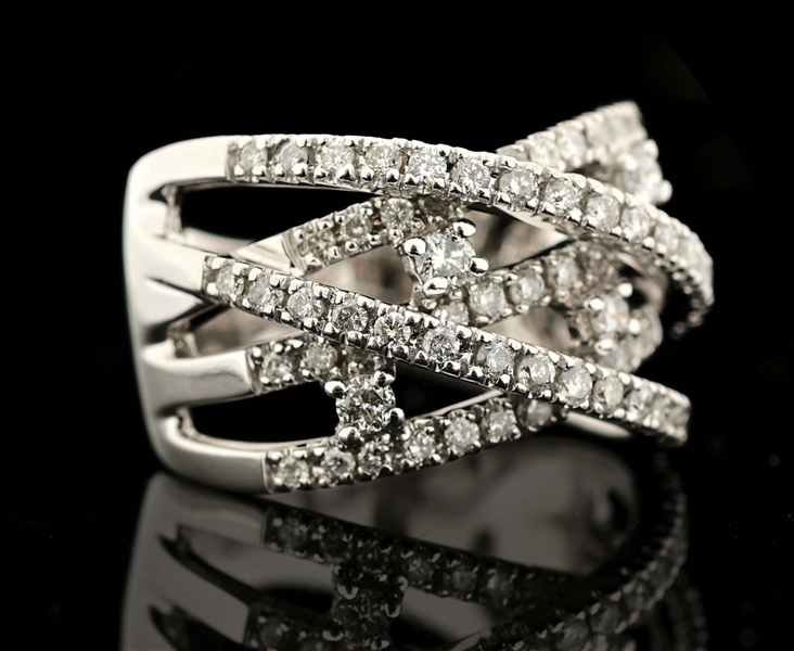 LADIES 14K WHITE GOLD DIAMOND CROSSOVER RING.